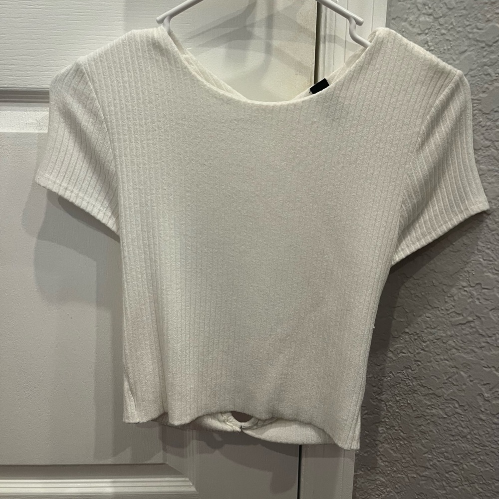 Open back white top